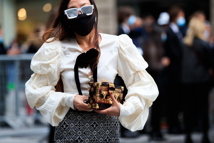 white sunglasses, white skirt, white shirt, white blouse, ruffle blouse, ruffle sleeves, ruffle shirt, monogrammed skirt, black skirt, animal skin clutch, mirror sunglasses, louis vuitton clutch, louis vuitton skirt, louis vuitton sunglasses, golden clutch, PARIS, PFW, fashion week, frenchystyle, FW, jonathan paciullo, street style, SPRING SUMMER 2021, SS 21, horizontal, atmosphere details, detail