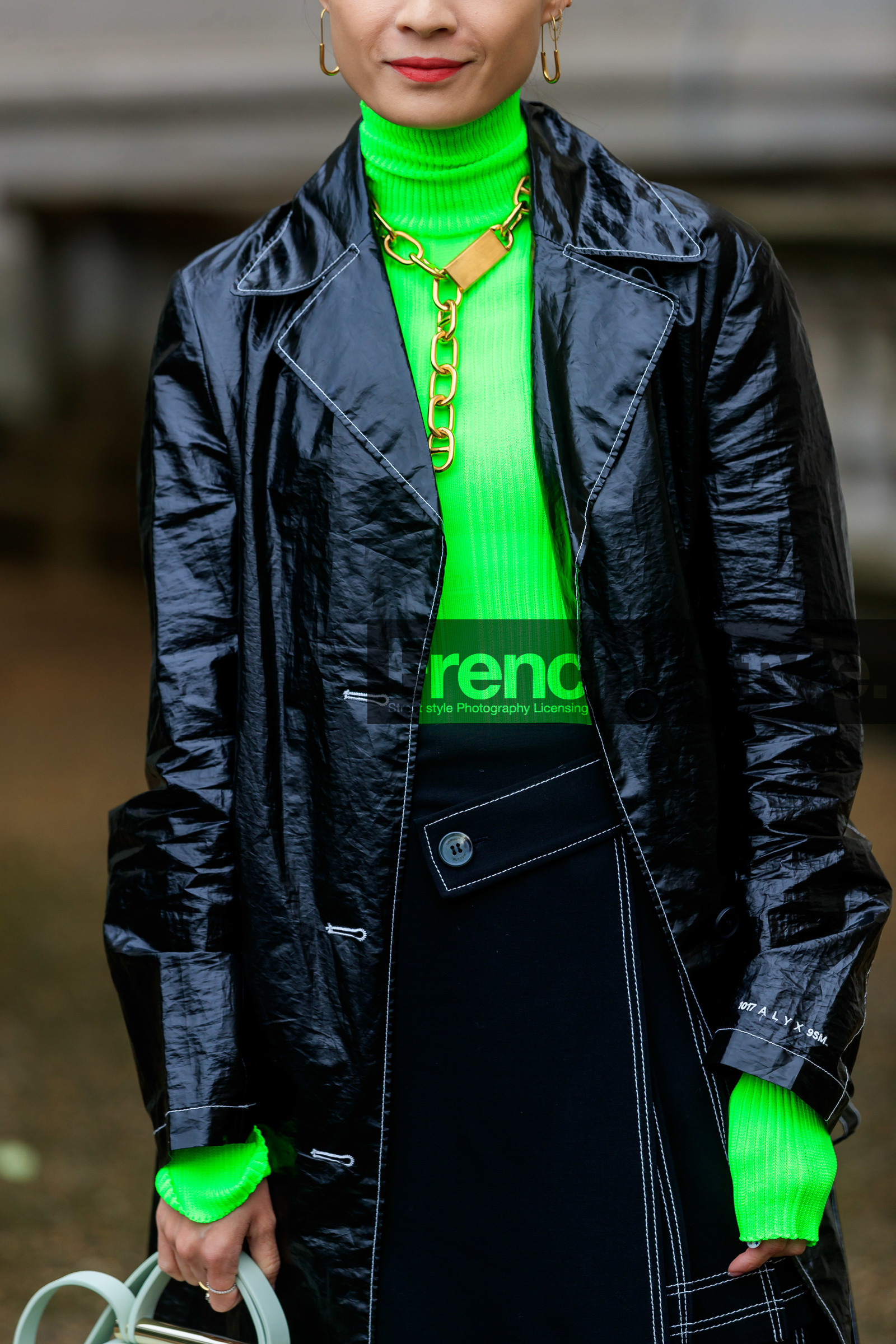 neon green pullover, turtleneck pullover, black polish trench coat, black skirt, golden earrings, golden necklace, margiela necklace, margiela earrings, margiela boots, close up detail, fashion week, frenchystyle, FW, jonathan paciullo, street style, SPRING SUMMER 2020, SS 20, PFW, PARIS, vertical, atmosphere details, detail