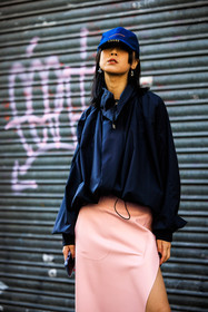 blue cap, pastel pink skirt, sporty look, sport jacket, navy blue jacker, beige sandals, beige heels, vivienne westwood earrings, street style, jonathan paciullo, FW, frenchystyle, fashion week, AUTUMN WINTER 2022-2023, FALL WINTER 2022_2023, FW 22-23, PFW, PARIS, vertical, detail