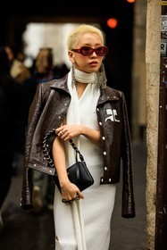 red glasses, short hair, blond hair, courreges jacket, pattent jacket, knitted dress, white dress, strass earrings, silver earrings, courreges handbag, leather bag, mini bag, fashion week, frenchystyle, FW, jonathan paciullo, street style, AUTUMN WINTER 2022-2023, FALL WINTER 2022_2023, FW 22-23, PFW, PARIS, vertical, detail, brown jacket, courreges