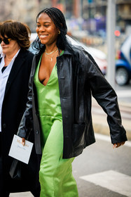 green jumpsuit, silk jumpsuit, open collar, fluo green jumpsuit, multiple necklaces, black jacket, leather jacket, braids, max mara, street style, jonathan paciullo, FW, frenchystyle, fashion week, MFW, MILAN, FALL WINTER 2022_2023, AUTUMN WINTER 2022-2023, FW 22-23, vertical, atmosphere details