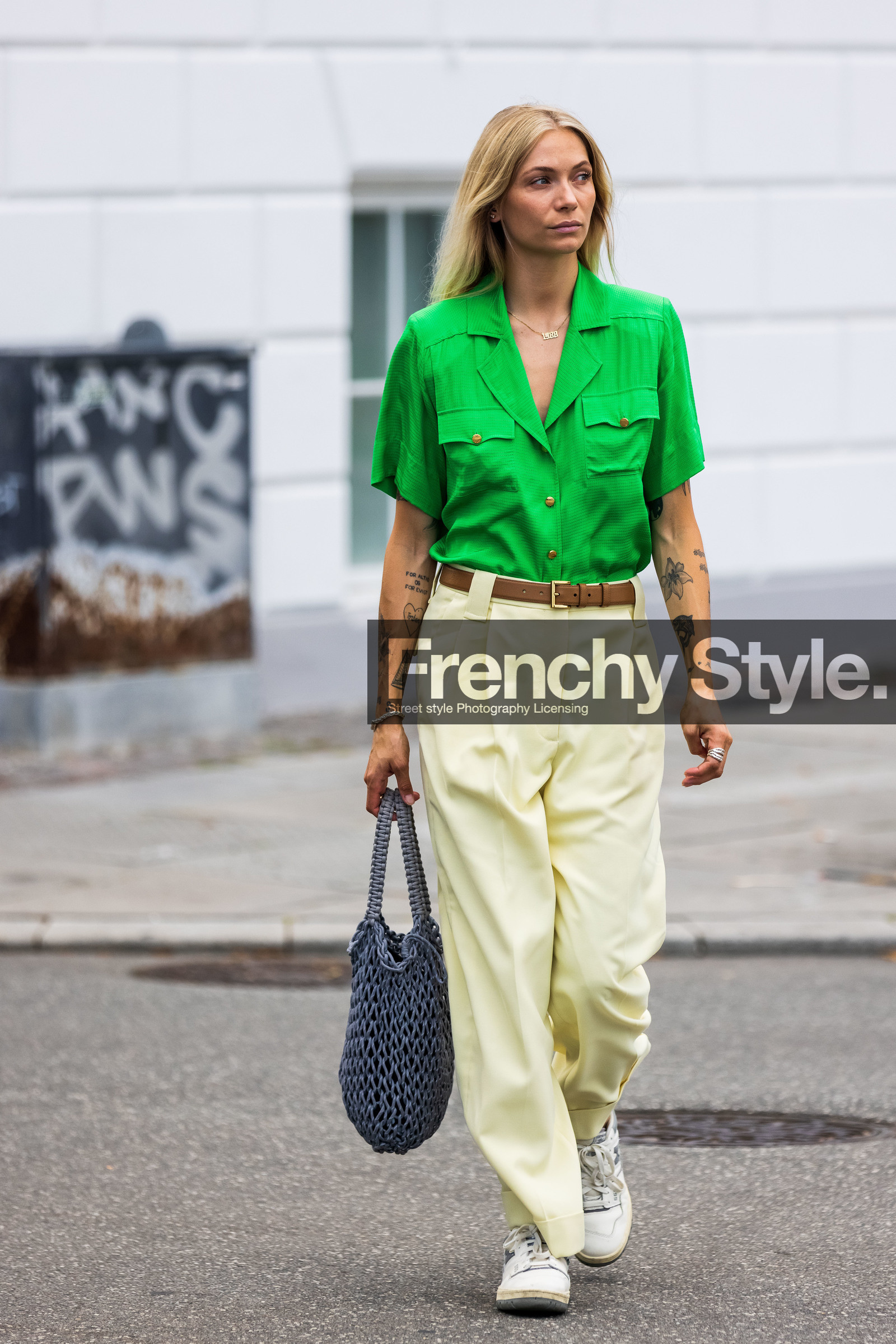 bag, belt, brown belt, color, fluid pants, fluo green shirt, green shirt, grey bag, knitted bag, leather belt, net bag, pants, pleated pants, shirt, sneakers, tattoo, white sneakers, yellow pants, Emilie Lilja, fashion week, frenchystyle, FW, jonathan paciullo, street style, SPRING SUMMER 2022, SS 22, COPENHAGEN, CPHFW, vertical, full length
