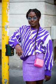 purple skirt, purple pullover, zebra printed pullover, suede skirt, mini skirt, pink leather bag, quilted bag, mini bag, chanel bag, square shape bag, round shape sunglasses, blue sunglasses, striped pullover, purple total look, lois opoku, street style, jonathan paciullo, FW, frenchystyle, fashion week, MFW, MILAN, SPRING SUMMER 2021, SS 21, vertical, detail