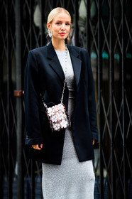 leonie hanne, silvered dress, tight dress, black jacket, paco rabanne bag, paco rabanne dress, crossbody bag, metalic bag, silvered bag, silvered chain strap bag, floral embroidered bag, plastic bag, strassed earrings, round shape earrings, big earrings, bag detail, earring cuff, earring detail, PARIS, PFW, fashion week, frenchystyle, FW, jonathan paciullo, street style, SPRING SUMMER 2021, SS 21, vertical, atmosphere details, detail