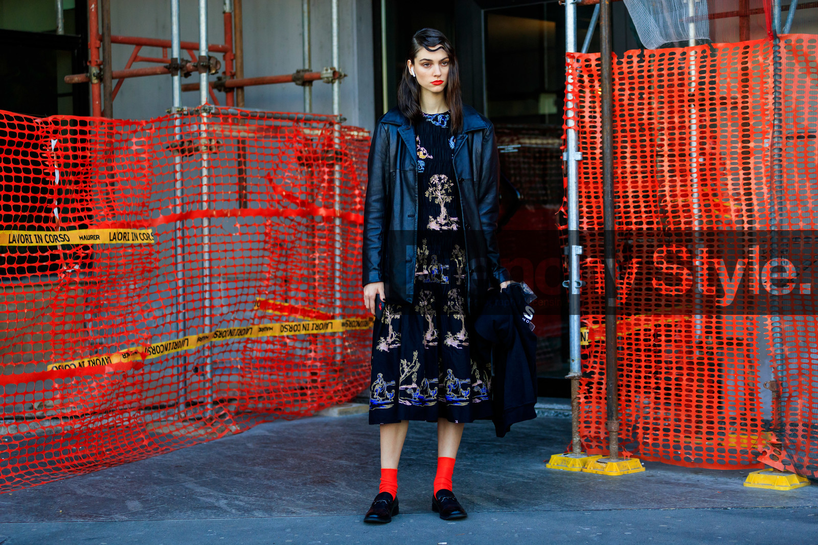 model, red lipstick, black dress, black leather jacket, embroidered dress, floral embroidered dress, smocked dress, long dress, red socks, black leather loafers, gucci shoes, fashion week, frenchystyle, FW, jonathan paciullo, street style, MFW, MILAN, AUTUMN WINTER 2020-2021, FALL WINTER 2020-2021, FW 20-21, horizontal, atmosphere details, full length