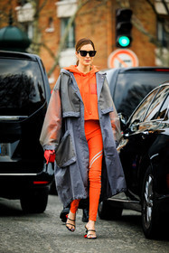 orange hoodie, rain coat, grey jacket, loewe coat, black sunglasses, orange leggings, red handbag, loewe handbag, black sandals, loewe shoes, loewe sandals, gala gonzalez, street style, jonathan paciullo, FW, frenchystyle, fashion week, AUTUMN WINTER 2022-2023, FALL WINTER 2022_2023, FW 22-23, PFW, PARIS, full length, vertical