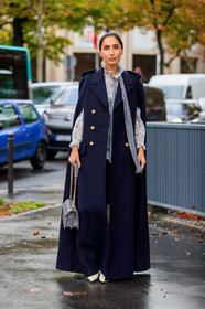 geraldine boublil, navy blue coat, navy blue cape, miu miu bag, grey leather bag, pleated bag, hand bag, light blue blouse, floral printed blouse, high collar blouse, long coat, PARIS, PFW, SPRING SUMMER 2020, SS 20, fashion week, frenchystyle, FW, jonathan paciullo, street style, vertical, full length