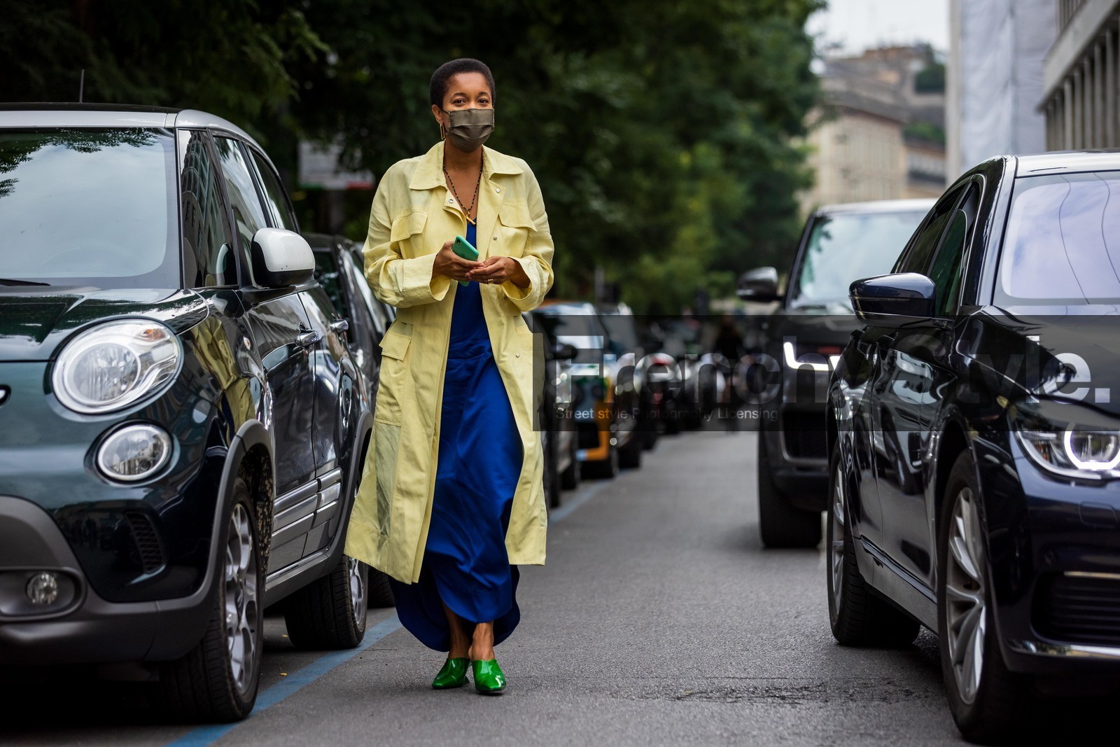 blue dress, coat, color, dress, earrings, electric blue dress, fluo green sandals, gold earrings, green sandals, green shoes, leather sandals, long coat, long dress, sunglasses, Tamu McPherson, yellow coat, facial mask, fashion week, frenchystyle, FW, jonathan paciullo, street style, SPRING SUMMER 2022, SS 22, MFW, MILAN, atmosphere details, horizontal, full length