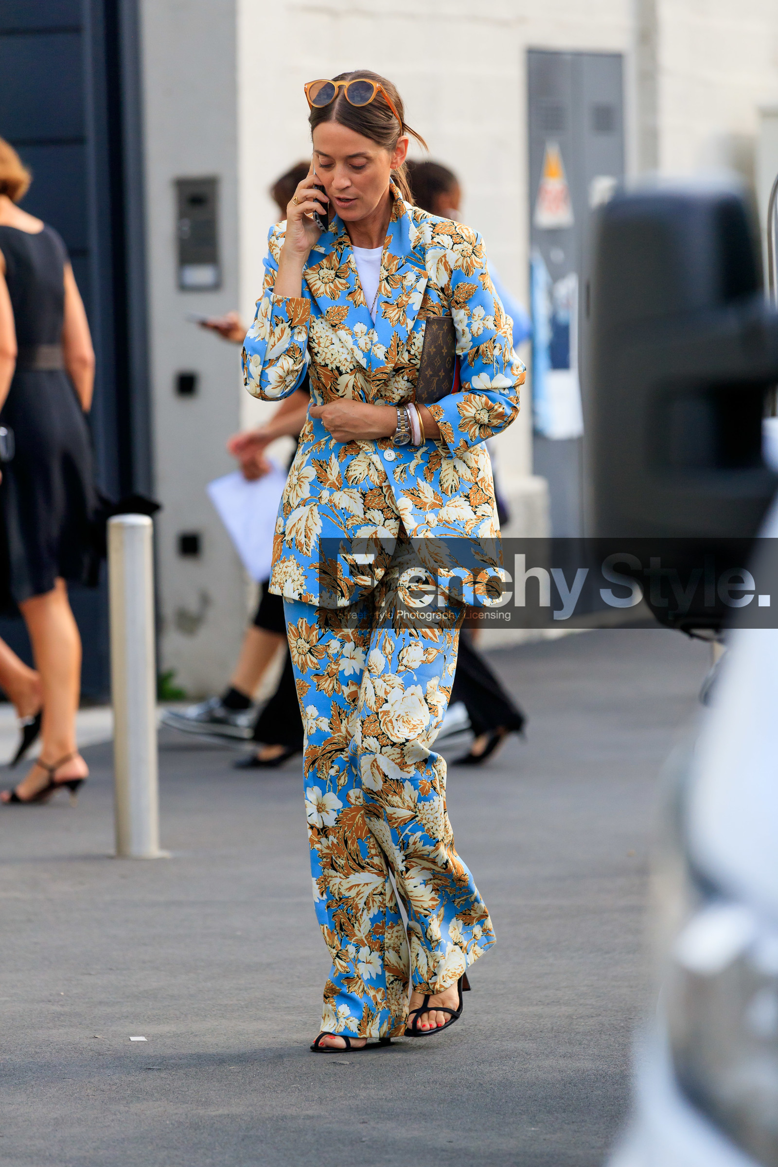 emily zak, floral print jacket, floral printed pants, floral printed suits, light blue jacket, light blue pants, yellow pants, yellow jacket, flare pants, rolex watch, silver and golden watch, man style watch, louis vuitton clutch, monogrammed clutch, fashion week, frenchystyle, FW, jonathan paciullo, street style, MFW, MILAN, SPRING SUMMER 2020, SS 20