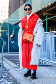 black shoes, earrings, Fur coat, leather bag, leather shoes, off the shoulder, orange bag, red jumpsuit, sunglasses, white coat, white fur, white sweater, street style, jonathan paciullo, FW, frenchystyle, fashion week, NYFW, NEW YORK, AUTUMN WINTER 2018-2019, AW 18-19, FALL WINTER 2018-2019, FW 18-19, vertical, full length, bettina looney