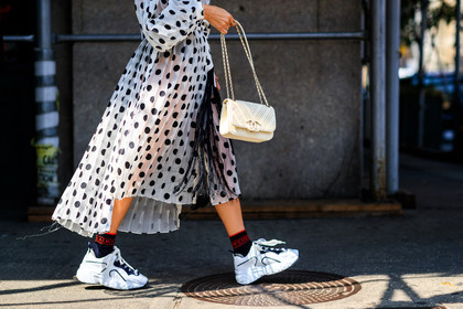 atmosphere details, black socks, chanel, courtney trop, detail, fashion week, frenchystyle, FW, graphic dress, horizontal, jonathan paciullo, leather bag, leather shoes, NEW YORK, NYFW, pleated dress, polka dot, printed dress, SPRING SUMMER 2018, SS 18, street style, white bag, white dress, white sneakers