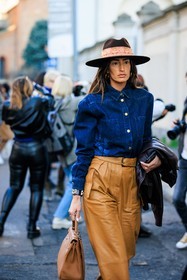 cowboy hat, denim shirt, buttoned shirt, highwaist pants, black leather pants, camel pants, leather belt, cowboy look, leather handbag, hermes handbag, studs, bracelet, golden loops, street style, jonathan paciullo, FW, frenchystyle, fashion week, MFW, MILAN, FALL WINTER 2022_2023, AUTUMN WINTER 2022-2023, FW 22-23, vertical, atmosphere details