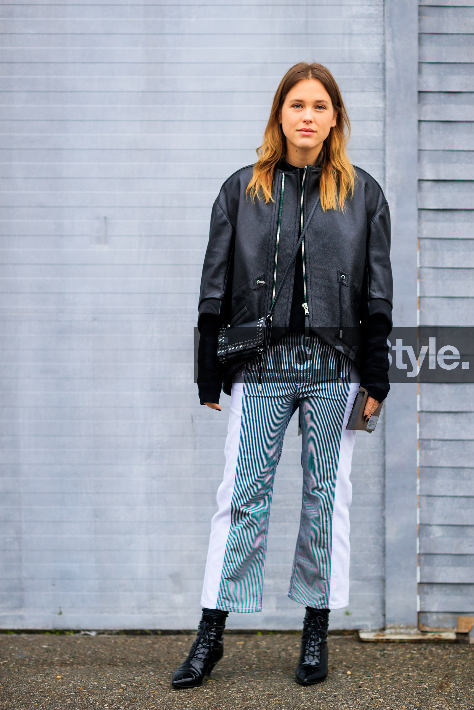AUTUMN WINTER 2017-2018, AW 17-18, black bag, black jacket, black shoes, blue denim, denim pants, FALL WINTER 2017-2018, fashion week, frenchystyle, full length, FW, FW 17-18, graphic pants, high heels, jeans, jonathan paciullo, leather bag, leather jacket, leather shoes, MFW, MILAN, prada, printed pants, street style, striped pants, trousers, varnished leather shoes, vertical