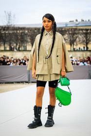boots, black boots biker shorts, mini lady dior bag, green bag, saddle bag, dior bag, beige cape, dior, long braids, golden watch, earrings, white shirt, fashion week, frenchystyle, FW, jonathan paciullo, street style, AUTUMN WINTER 2022-2023, FALL WINTER 2022_2023, FW 22-23, PFW, PARIS, vertical, full length