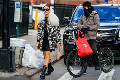 tamara kalinic, longchamps coat, white coat, black coat, fur coat, logo printed coat, monogrammed coat, longchamps dress, pleated dress, black dress, lace dress, monogrammed dress, prada bag, light beige bag, hand bag, black sunglasses, strassed sunglasses, golden earrings, dangling earrings, black leather boots, chelsea boots, flat boots, quilted boots, mini dress, fashion week, frenchystyle, FW, jonathan paciullo, street style, AUTUMN WINTER 2020-2021, FALL WINTER 2020-2021, FW 20-21, horizontal, atmosphere details, full length, NYFW, NEW YORK
