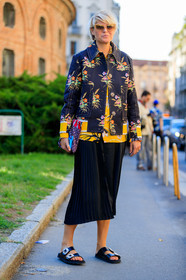black jacket, black sandals, black shoes, black skirt, elisa nalin, fashion week, floral, flowers, frenchystyle, full length, FW, graphic jacket, graphic shirt, jonathan paciullo, leather bag, leather shoes, MFW, MILAN, pleated skirt, printed jacket, printed shirt, SPRING SUMMER 2018, SS 18, street style, sunglasses, vertical, yellow shirt