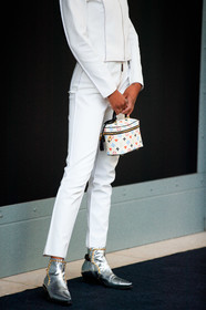 laura harrier, white jacket, white pants, white leather bag, box bag, hand bag, square shape bag, monogrammed bag, technical fabric jacket, technical fabric pants, zipped jacket, louis vuitton bag, louis vuitton jacket, louis vuitton pants, louis vuitton boots, louis vuitton total look, white total look, silvered boots, studs boots, flat boots, chain detail shoes, PARIS, PFW, fashion week, frenchystyle, FW, jonathan paciullo, street style, SPRING SUMMER 2021, SS 21, vertical, atmosphere details, detail