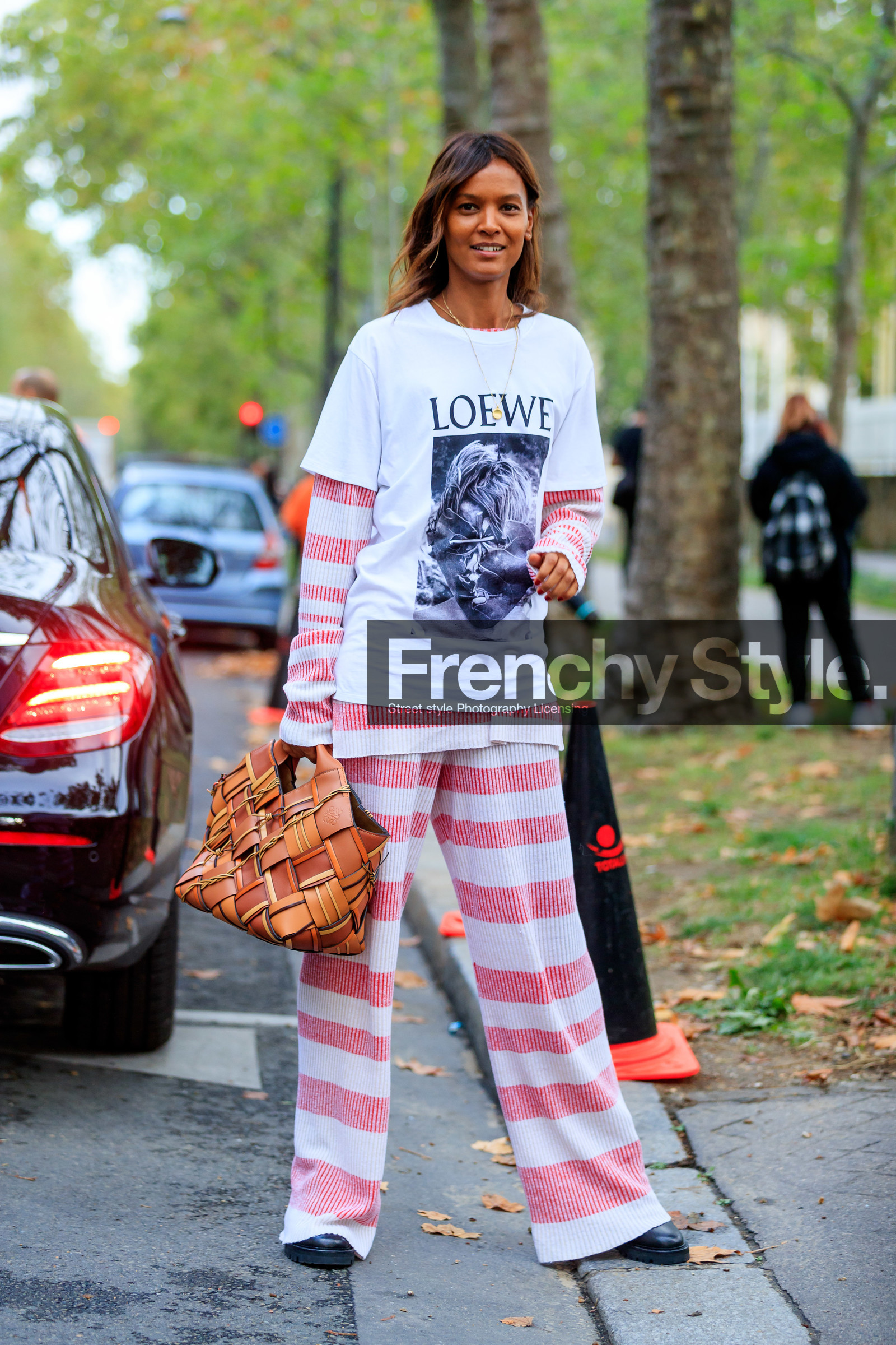 model, Liya Kebede, loewe bag, loewe t-shirt, white t-shirt, printed t-shirt, oversize t-shirt, knitwear, knit pants, knit top, striped top, striped pullover, striped pants, red pants, red pullover, red top, white pants, white pullover, white top, loose pants, plaited leather bag, plaited bag, camel leather bag, hand bag, fashion week, frenchystyle, FW, jonathan paciullo, street style, SPRING SUMMER 2020, SS 20, PFW, PARIS, vertical, full length