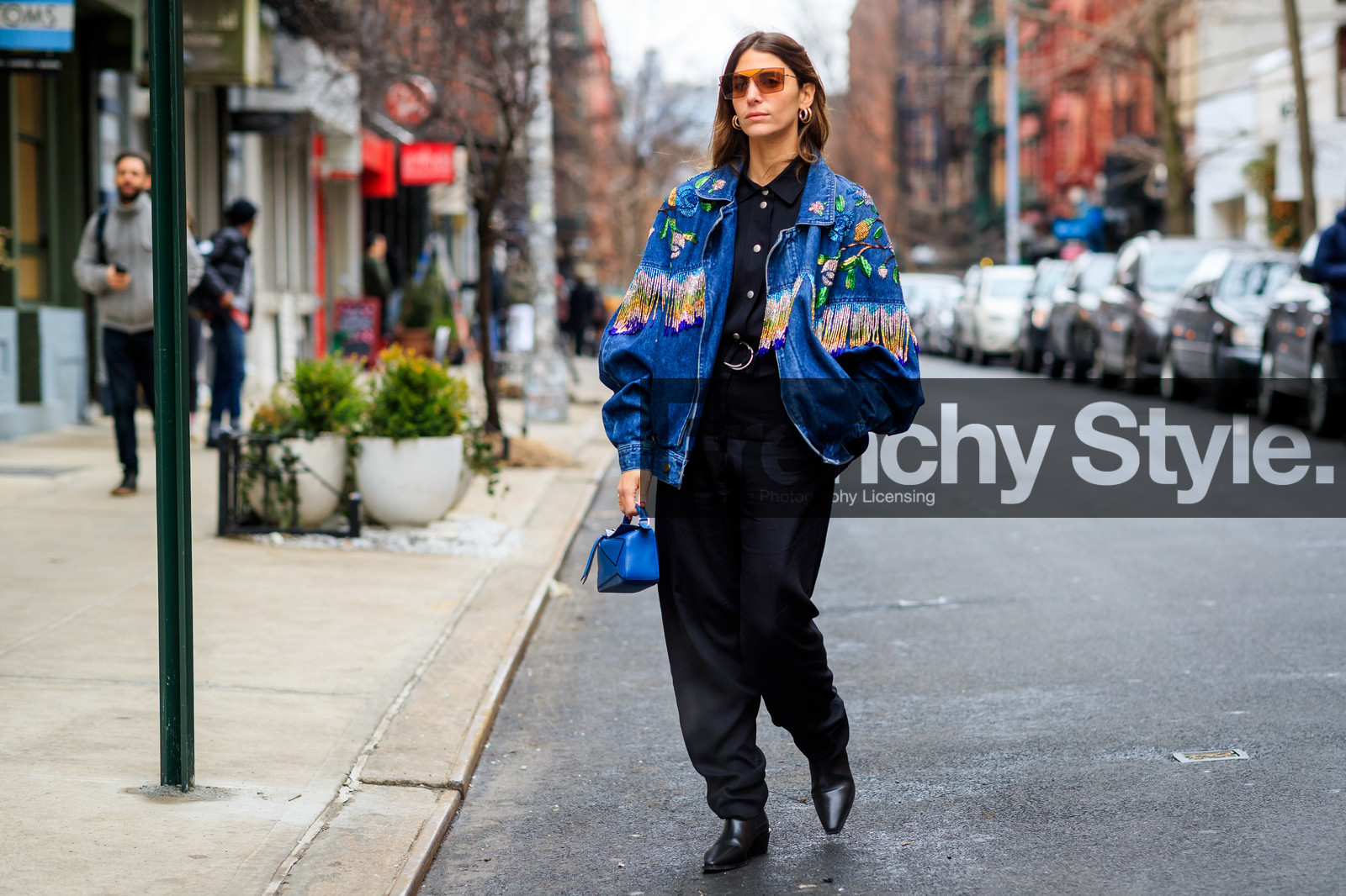 black jumpsuit, black pants, black shoes, blue bag, blue denim, denim jacket, embroidered jacket, fringes, graphic jacket, high heels, jen wonders, leather bag, leather shoes, loewe, pearls, printed jacket, sunglasses, trousers, street style, jonathan paciullo, frenchystyle, NYFW, NEW YORK, AUTUMN WINTER 2019-2020, AW 19-20, FALL WINTER 2019-2020, FW 19-20, fashion week, FW, atmosphere details, horizontal, full length