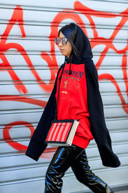 AUTUMN WINTER 2017-2018, AW 17-18, balenciaga, black pants, detail, FALL WINTER 2017-2018, fashion week, frenchystyle, FW, FW 17-18, hood, hoodie, jonathan paciullo, leather bag, leather pants, MFW, MILAN, printed bag, red bag, red sweater, street style, striped bag, sunglasses, trousers, vertical, vêtements