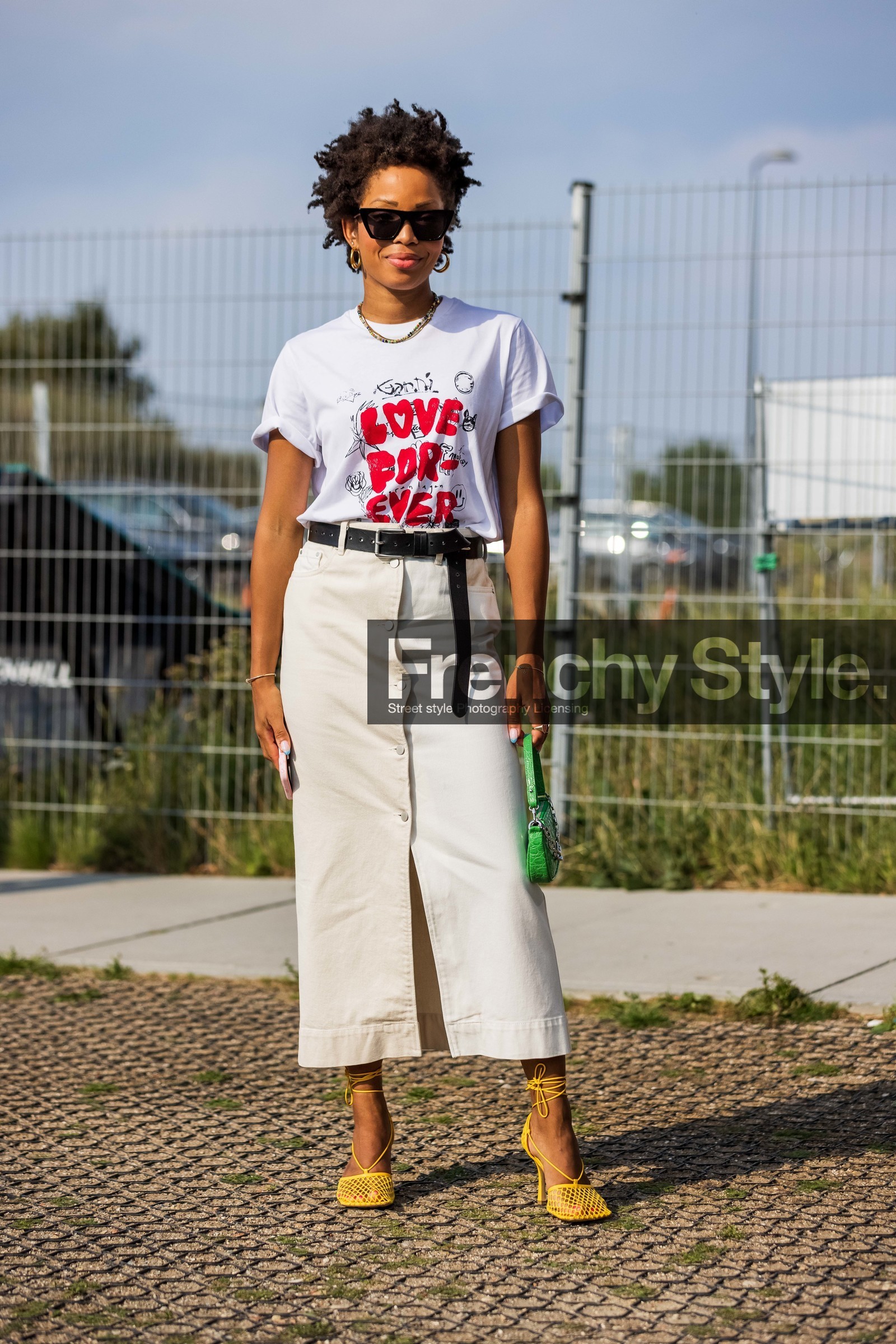 bag, belt, black belt, black sunglasses, bottega veneta sandals, croco bag, denim skirt, earrings, fluo green bag, gold earrings, green bag, hoops, lace up sandals, leather belt, long skirt, print, printed t-shirt, quote, sandals, skirt, sunglasses, t-shirt, white t-shirt, yellow sandals, Ellie Delphine, fashion week, frenchystyle, FW, jonathan paciullo, street style, SPRING SUMMER 2022, SS 22, COPENHAGEN, CPHFW, vertical, full length