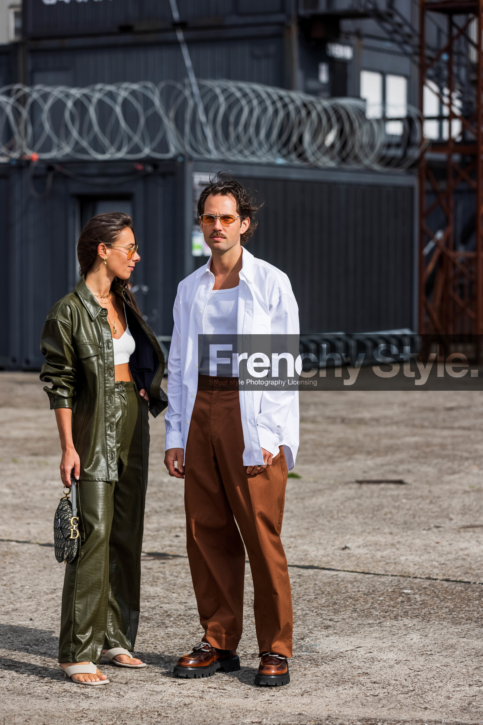 Jean-Sebastien Roques, Alice Barbier, kaki leather jacket, kaki leather pants, kaki leather shirt, overshirt, overshirt jacket, oversize jacket, oversize shirt, loose pants, white top, cropped top, aviator sunglasses, orange sunglasses, vogue sunglasses, animal skin jacket, animal skin pants, animal skin shirt, dior bag, dior saddle bag, monogrammed bag, blue bag, white leather sandals, white leather slippers, kitten heel sandals, kitten heels sandals, kitten heels slippers, brown leather loafers, brown pants, silvered buckle shoes, prada shoes, prada loafers, big sole loafers, white t-shirt, white shirt, hand bag, fashion week, frenchystyle, FW, jonathan paciullo, street style, SPRING SUMMER 2022, SS 22, COPENHAGEN, CPHFW, vertical, full length
