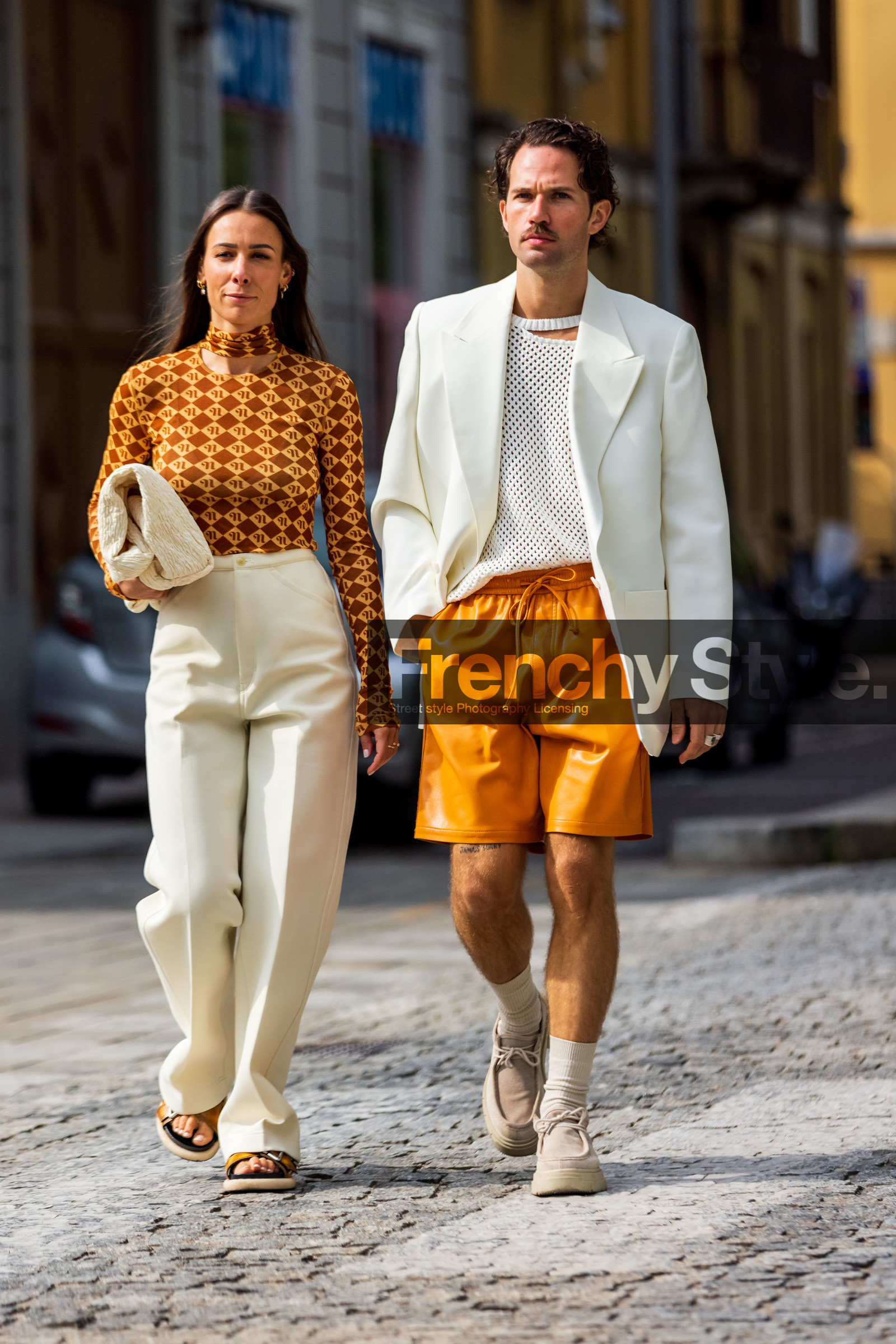 Alice Barbier, beige moccassins, beige shoes, color, couple, cream bag, cream pants, duo, Jean-Sebastien Roques, knit, menswear, mesh top, moccasins, orange short, orange turtleneck, pants, printed turtleneck, sandals, short, turtleneck, white bag, white blazer, white knit, white pants, white top, fashion week, frenchystyle, FW, jonathan paciullo, street style, SPRING SUMMER 2022, SS 22, MFW, MILAN, vertical, full length