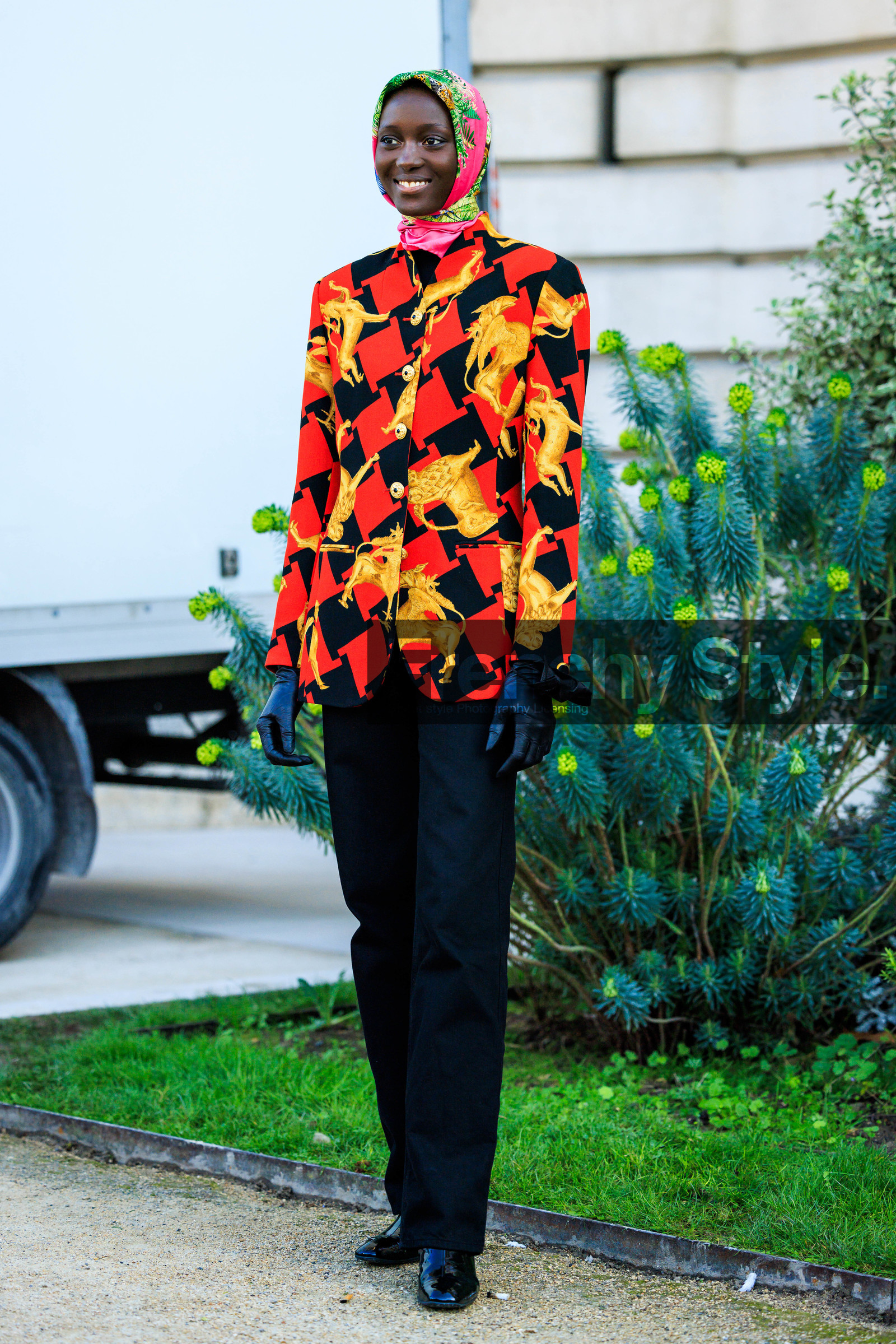 model, printed scarf, head scarf, multicolor scarf, buttoned blazer, red blazer, printed blazer, animal motif, plaid blazer, black pants, black gloves, leather gloves, black trousers, black shoes, fashion week, frenchystyle, FW, jonathan paciullo, street style, PARIS, PFW, SPRING SUMMER 2022, SS 22, full length, vertical