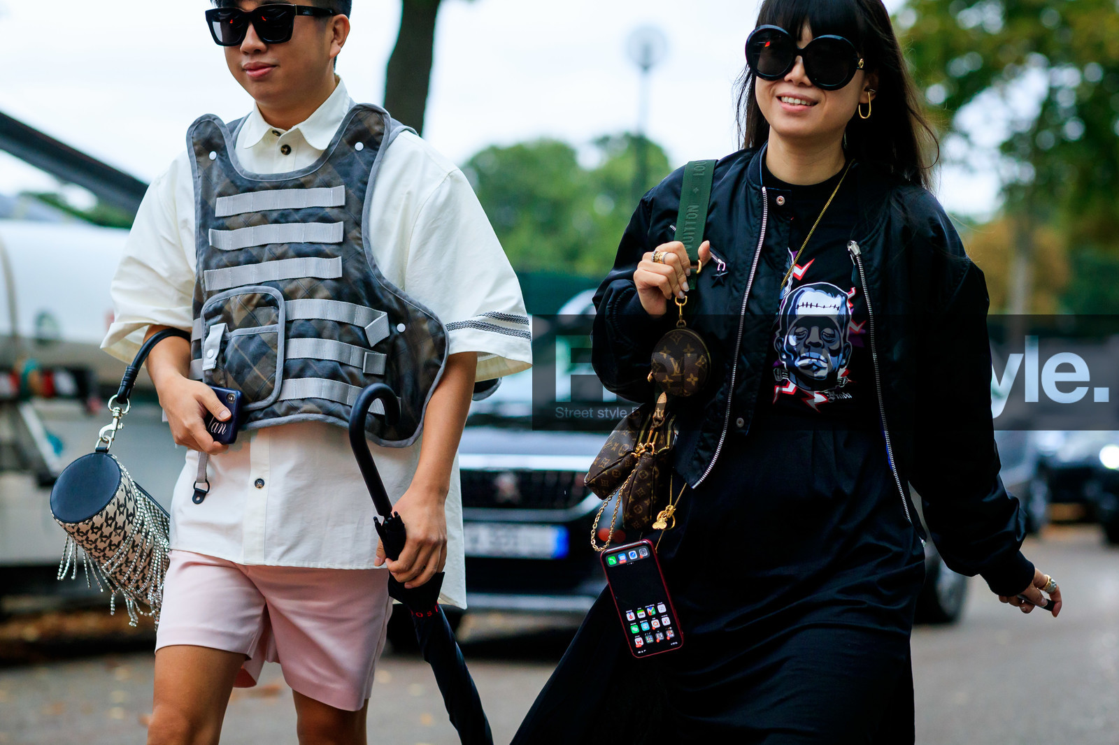 declan chan, leaf greener, black jacket, black bombers, satin jacket, black sunglasses, round shape sunglasses, black t-shirt, prada t-shirt, printed t-shirt, black skirt, louis vuitton bag, brown leather bag, round shape bag, monogrammed bag, logo strap bag, green strap bag, multi bag, iphone, fashion week, frenchystyle, FW, jonathan paciullo, street style, SPRING SUMMER 2020, SS 20, PFW, PARIS, horizontal, atmosphere details, detail
