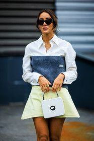 white shirt, knitted strapless top, grey top, coperni bag, logo bag, white handbag, coperni, black sunglasses, pastel yellow skirt, mini skirt, tamara kalinic, street style, jonathan paciullo, FW, frenchystyle, fashion week, AUTUMN WINTER 2022-2023, FALL WINTER 2022_2023, FW 22-23, PFW, PARIS, vertical, detail