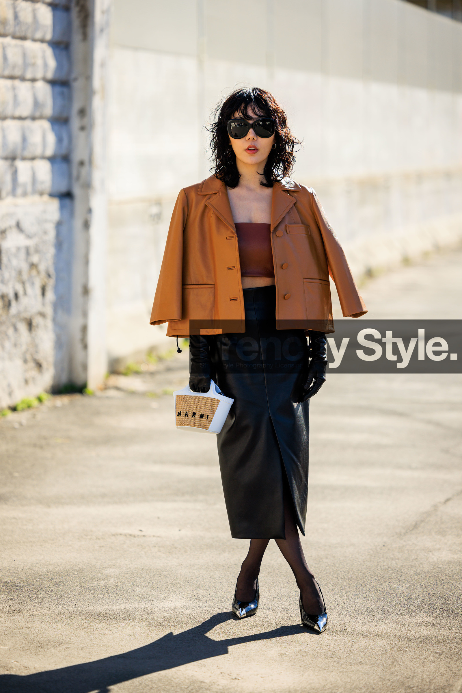 wet hair look, camel jacket, leather short jacket, brown bandeau, strapless top, brown top, black skirt, leather skirt, black gloves, leather gloves, black sunglasses, mani bag, mini bag, mini cabas bag, black stilettos, fashion week, frenchystyle, FW, jonathan paciullo, street style, vertical, full length