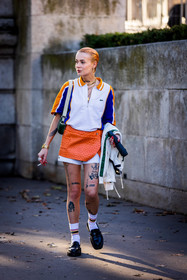 black loafers, black mocassins, blue polo, lacoste look, loafers, mini skirt, mocassins, Moesta Errabunda, orange skirt, polo, skirt, socks, tattoo, white polo, white shorts, white socks, zipped polo, lacoste, fashion week, frenchystyle, FW, jonathan paciullo, street style, PFW, PARIS, SPRING SUMMER 2022, SS 22, vertical, full length