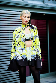 blond hair, make up, printed look, floral look, valentino, yellow scarf, floral bra, floral shorts, floral shirt, yellow whirt, black stockings, amalie gassmann, street style, jonathan paciullo, FW, frenchystyle, fashion week, AUTUMN WINTER 2022-2023, FALL WINTER 2022_2023, FW 22-23, PARIS, PFW, vertical, detail, floral scarf