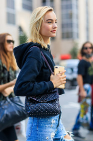 atmosphere details, black bag, black sweater, blue denim, chanel, denim pants, detail, fashion week, frenchystyle, FW, hoodie, iphone, jeans, jonathan paciullo, leather bag, Maartje Verhoef, model, NEW YORK, NYFW, ripped pants, SPRING SUMMER 2018, SS 18, street style, trousers, vertical