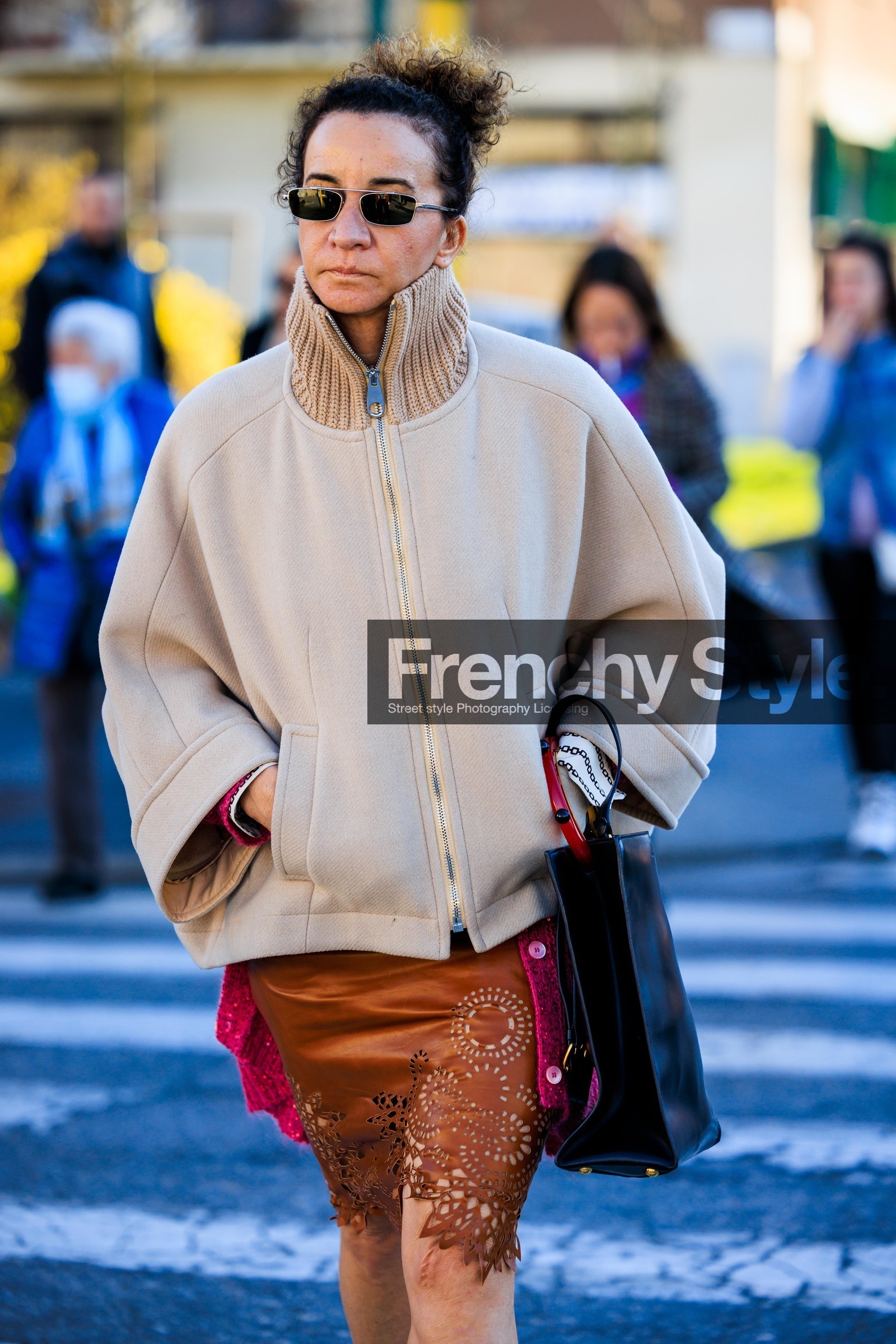 beige jacket; knitted jacket; black sunglasses; english broderies skirt; brown skirt; leather jacket; black handbag; leather handbag