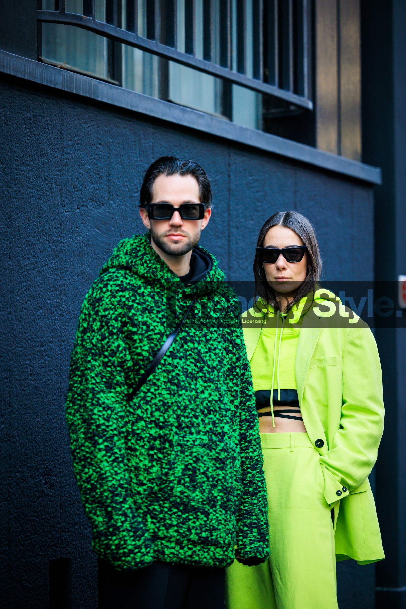 printed hoodie, black pants, black boots, leather boots, cropped hoodie, fluo green hoodie, crossed laces top, printed fluo look, black sunglasses, fluo green pants, black sunglasses, cat eye sunglasses, fluo green suit, alice barbier, JS roques, alice & j.s, fashion week, frenchystyle, FW, jonathan paciullo, street style, vertical, atmosphere details, detail
