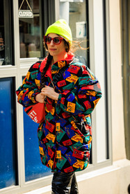 love print jacker, saint laurent jacker, vintage jacket, printed jacker, neon beanie, red sunglasses, leather trousers, fannypack, red bag, street style, jonathan paciullo, FW, frenchystyle, fashion week, AUTUMN WINTER 2022-2023, FALL WINTER 2022_2023, FW 22-23, PFW, PARIS, vertical, detail
