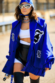 blue hood, silver sunglasses, blue jacket, logo jacket, black shors, leather shorts, white boxers, blue handbag, silver choker, karina nigay, fashion week, frenchystyle, FW, jonathan paciullo, street style, vertical, atmosphere details, detail
