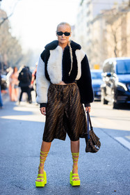 fendi logo short, printed short, silk shorts, fendi, green fluo sandals, laced sandals, platform sandals, platform shoes, furry jacket, dual toned jacket, fluffy coat, black sunglasses, fendi logo bag, baguette fendi bag, brown bag, brown shorts, long braids, fashion week, frenchystyle, FW, jonathan paciullo, street style, MFW, MILAN, FALL WINTER 2022_2023, AUTUMN WINTER 2022-2023, FW 22-23, vertical, full length