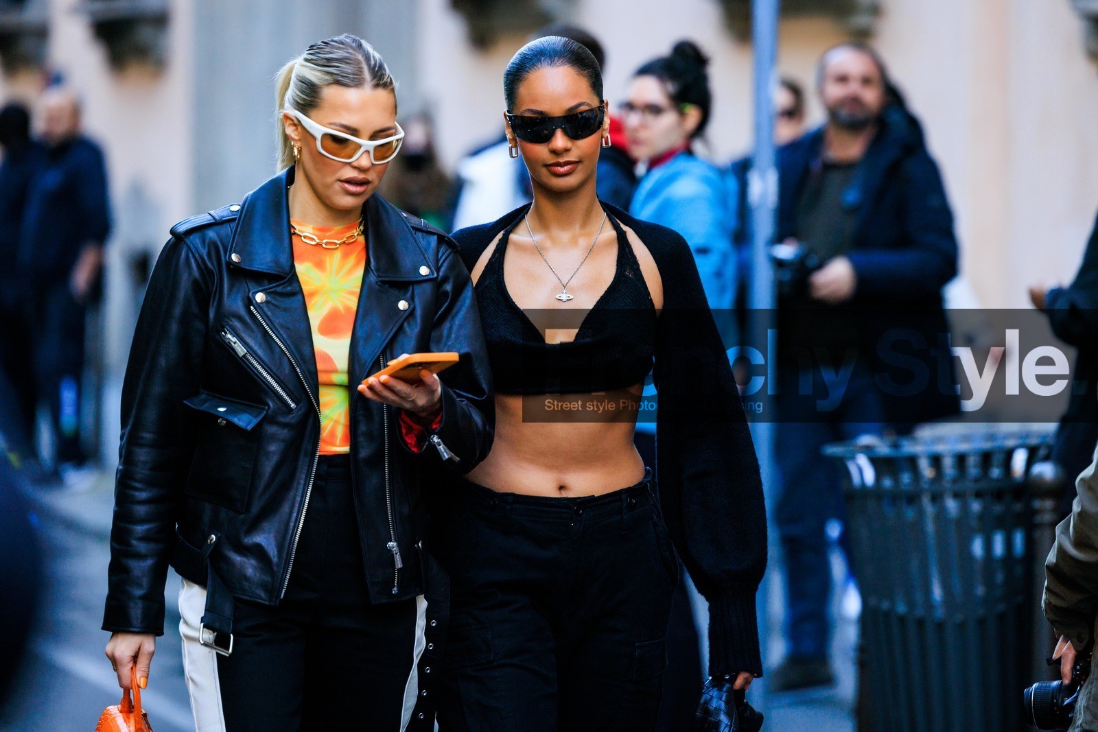 black bra, black cardigan, black sunglasses, silver loops, white sunglasses tie dye top, orange top, biker jacket, black jacket, black pants, details, fashion week, frenchystyle, FW, jonathan paciullo, street style, atmosphere details, horizontal