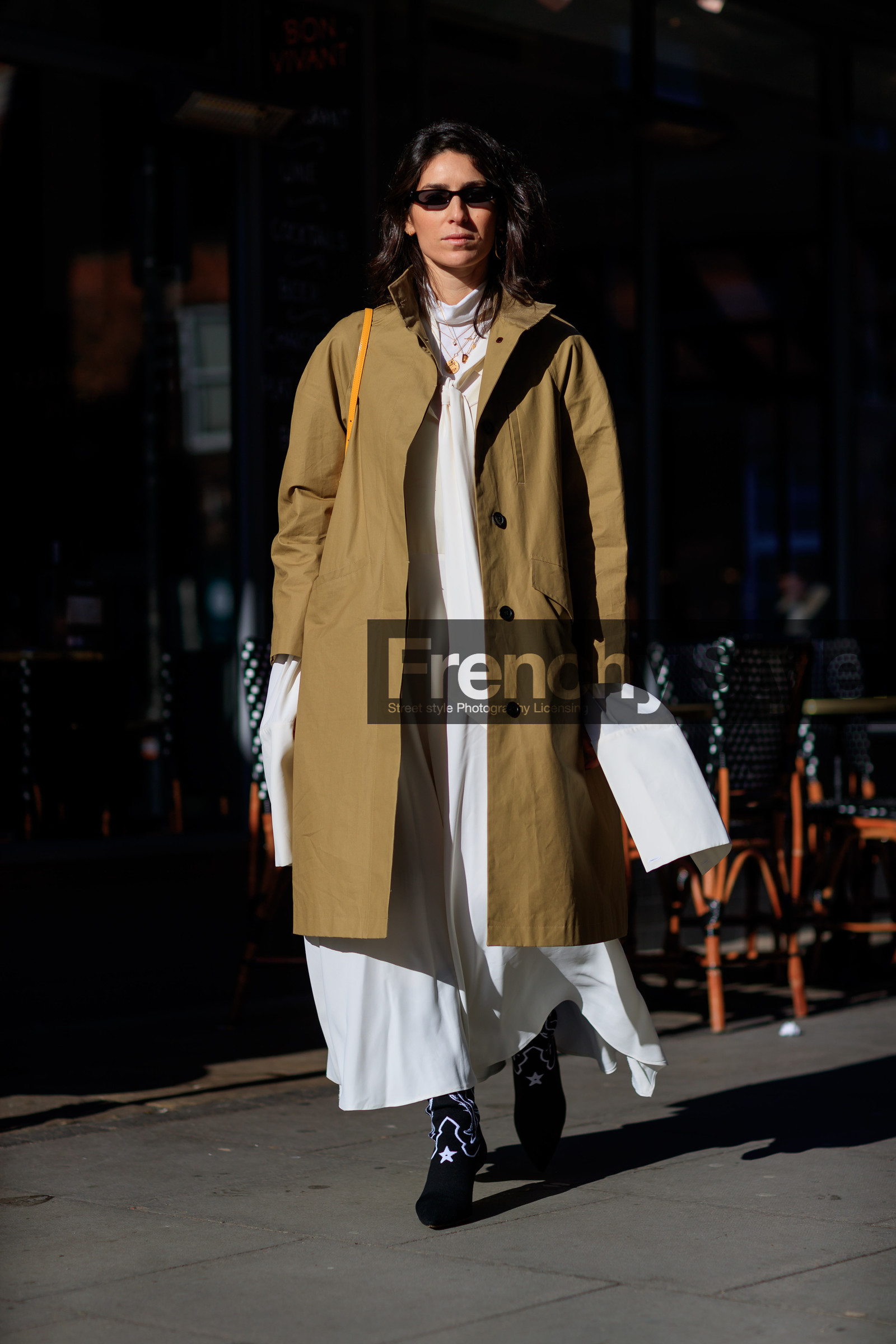 beige coat, black shoes, cowboy boots, high heels, leather shoes, sunglasses, white dress, street style, jonathan paciullo, FW, frenchystyle, fashion week, LFW, LONDON, AUTUMN WINTER 2018-2019, AW 18-19, FALL WINTER 2018-2019, FW 18-19, vertical, full length, deborah reyner sebag