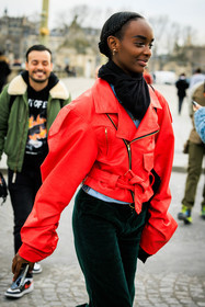 leather jacket, biker jacket, red jacket, black scard, model, braided hair, make up, close up, dark green pants, black scarf, fashion week, frenchystyle, FW, jonathan paciullo, street style, AUTUMN WINTER 2022-2023, FALL WINTER 2022_2023, FW 22-23, PFW, PARIS, vertical, detail