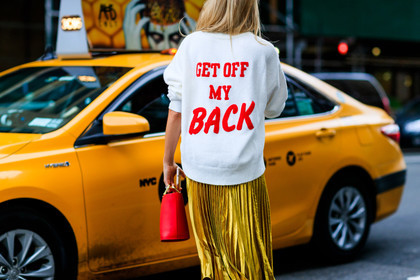 atmosphere details, back detail, detail, fashion week, frenchystyle, FW, golden skirt, horizontal, jonathan paciullo, leather bag, message, NEW YORK, NYFW, pleated skirt, printed sweater, red bag, SPRING SUMMER 2018, SS 18, street style, white sweater, yellow skirt