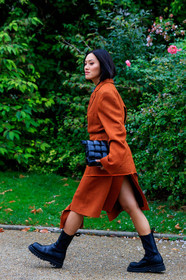 Tiffany Hsu, orange jacket, orange skirt, black leather bag, black leather clutch, black leather boots, chelsea boots, big sole boots, plaited bag, bottega veneta bag, split skirt, mid long skirt, fashion week, frenchystyle, FW, jonathan paciullo, street style, SPRING SUMMER 2020, SS 20, PFW, PARIS, vertical, full length