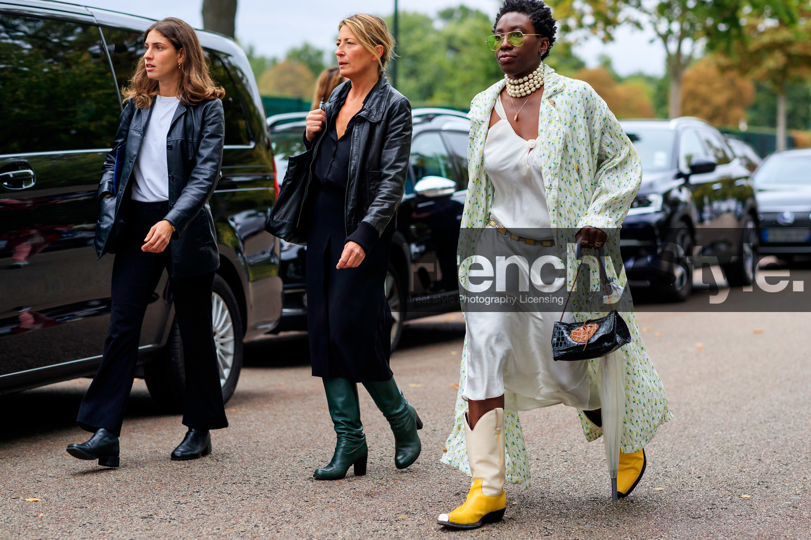 pleated jacket, white jacket, floral print jacket, pearl necklace, chain belt, silvered belt, white dress, satin dress, drape dress, sleeveless dress, belted dress, green sunglasses, metalic frame sunglasses, aviator sunglasses, yellow leather boots, white leather boots, cowboy boots, animal skin bag, black leather bag, brown leather bag, mid long dress, green leather boots, high heels boots, high boots, black skirt, black leather jacket, mid long skirt, black shirt, fashion week, frenchystyle, FW, jonathan paciullo, street style, SPRING SUMMER 2020, SS 20, PFW, PARIS, horizontal, atmosphere details, full length