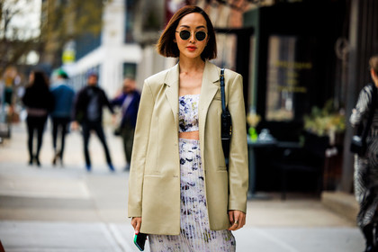 straight leather beige blazer, black sunglasses, white knitted printed skirt, white knitted cropped top, black handbag, biker shorts, Chriselle Lim, fashion week, frenchystyle, FW, jonathan paciullo, street style, NYFW, NEW YORK, AUTUMN WINTER 2022-2023, FALL WINTER 2022_2023, FW 22-23, atmosphere details, horizontal