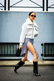 coperni dress, cut out dress, midi dress, black heeled boots, leather boots, bomber jacket, white jacket, black sunglasses, silver loop earrings, black coperni bag, coperni, Chriselle Lim, street style, jonathan paciullo, FW, frenchystyle, fashion week, AUTUMN WINTER 2022-2023, FALL WINTER 2022_2023, FW 22-23, PFW, PARIS, full length, vertical