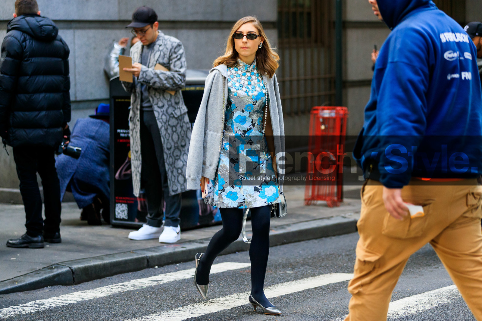 blue dress, floral, flowers, graphic dress, grey sweater, hoodie, jenny walton, leather shoes, printed dress, shiny dress, silver dress, silver shoes, sunglasses, tights, street style, jonathan paciullo, frenchystyle, NYFW, NEW YORK, AUTUMN WINTER 2019-2020, AW 19-20, FALL WINTER 2019-2020, FW 19-20, FW, fashion week, atmosphere details, horizontal, full length