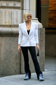 xenia adonts, white jacket, white sunglasses, big sunglasses, aviator sunglasses, futurist shape sunglasses, geometric shape glasses, pearl earrings, pearl necklace, dangling earrings, hoop earrings, black leather bag, jacquemus bag, mini bag, hand bag, black pants, black top, low necked top, split pants, grey sneakers, balenciaga sneakers, fashion week, frenchystyle, FW, jonathan paciullo, street style, NYFW, NEW YORK, AUTUMN WINTER 2020-2021, FALL WINTER 2020-2021, FW 20-21, vertical, full length