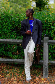 model, black leather jacket, white leather pants, oversize jacket, blue blouse, floral printed blouse, golden earrings, dangling earrings, brown leather bag, box bag, hand bag, animal skin boots, fashion week, frenchystyle, FW, jonathan paciullo, street style, SPRING SUMMER 2020, SS 20, PFW, PARIS, vertical, full length